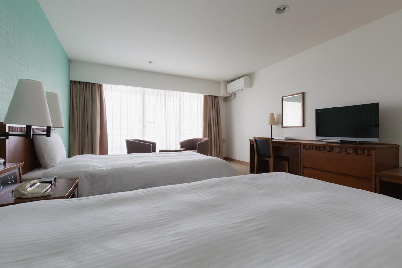 Em Wellness Kurashinohakko Lifestyle Resort Okinawa Habitación foto